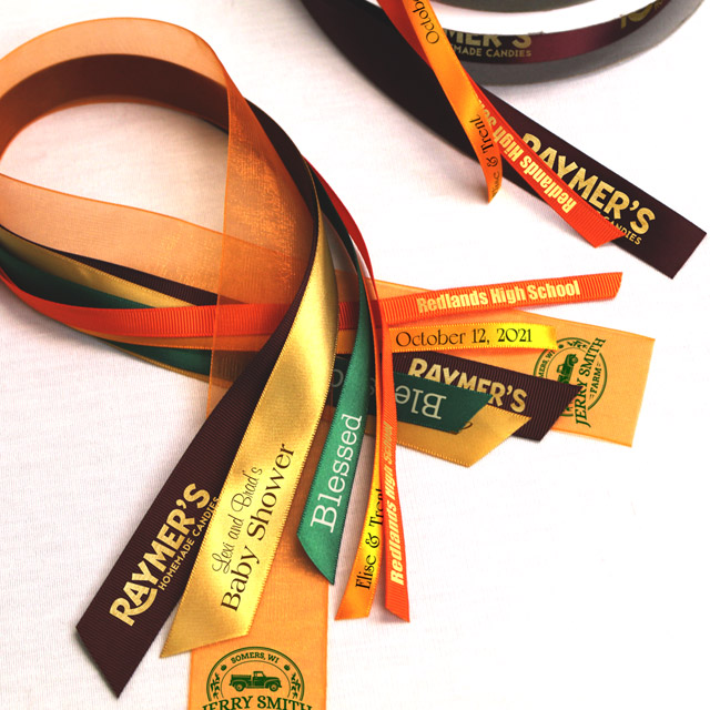 A variety of favor print ribbon rolls.
