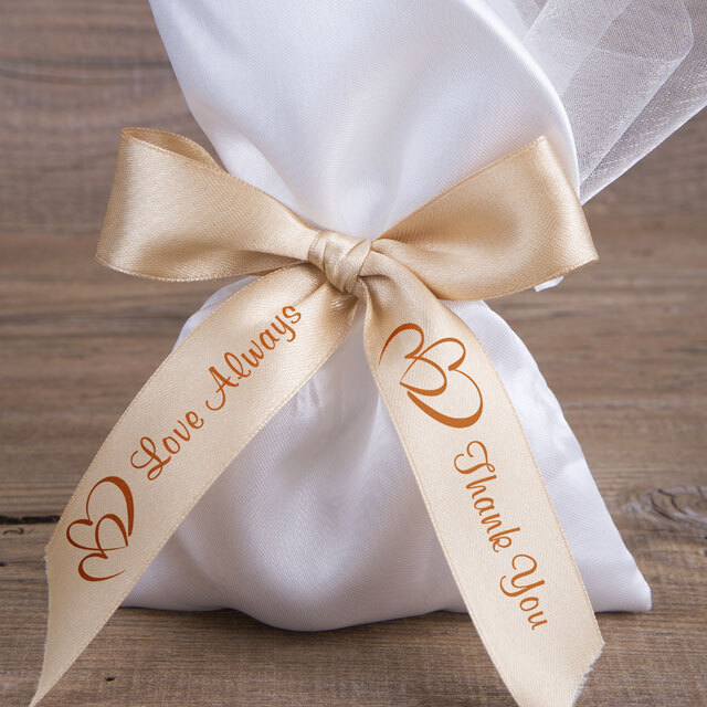 Raw silk ribbon with 'Love always' message tied ti a favor