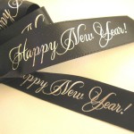 custom ribbon rolls and wishing a happy new year