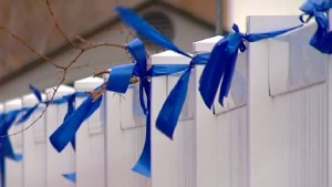 Blue Remembrance Prayer Ribbons blue ribbon rolls used in a community prayer ribbon campaign