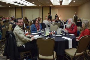 coller industries incorporated annual employee christmas party with fun prizes and a juggler