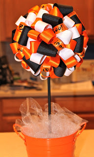 fall and halloween ribbons used to make a ribbon topiary