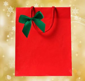 use green bows with red bags for holiday bows and corporate gifting