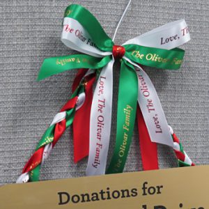 using personalized ribbons and custom signs for holiday decorations for home and office