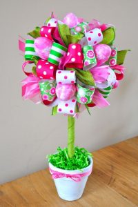 Easter ribbons in pinks, greens and whites to make a festive topiary with ribbon and flowers.