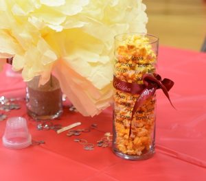 use custom ribbon rolls for your wedding as table decorations and centerpieces