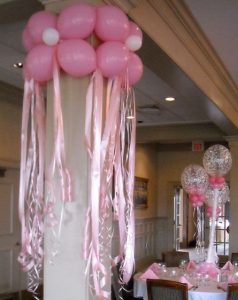 use ribbon rolls and balloons to create unique decorations for your next event