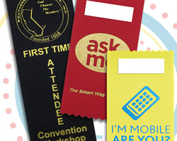 Three badge ribbons with imprinting for event needs.