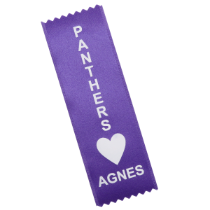 A purple ribbon with a vertical orientation, imprinted with gold text and a heart graphic used for special olympics.