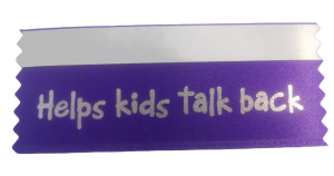 Create a fun work culture with a purple badge ribbon that reads, Helps kids talk back.