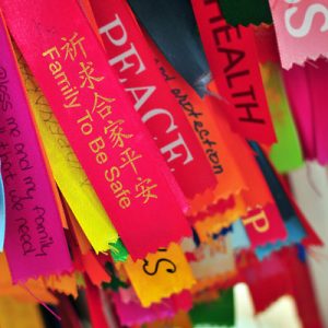 Prayer ribbons with messages of caring and understanding.