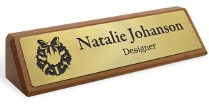 Desk Wedge with an engraved metal plate with a name, title and holiday graphic.
