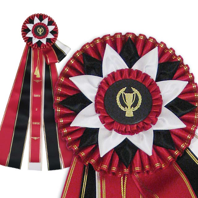 Red, black and white five streamer guernsey rosette